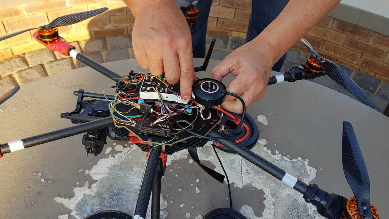 Hands-on integration of flight-control electronics in an early multirotor prototype